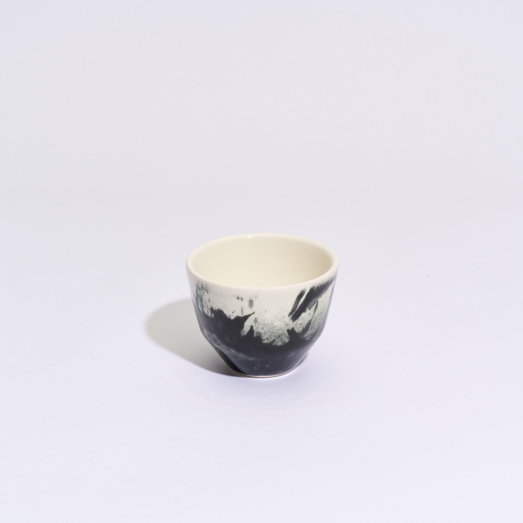 Handcrafted Porcelain Coffee Cup | Black Splash